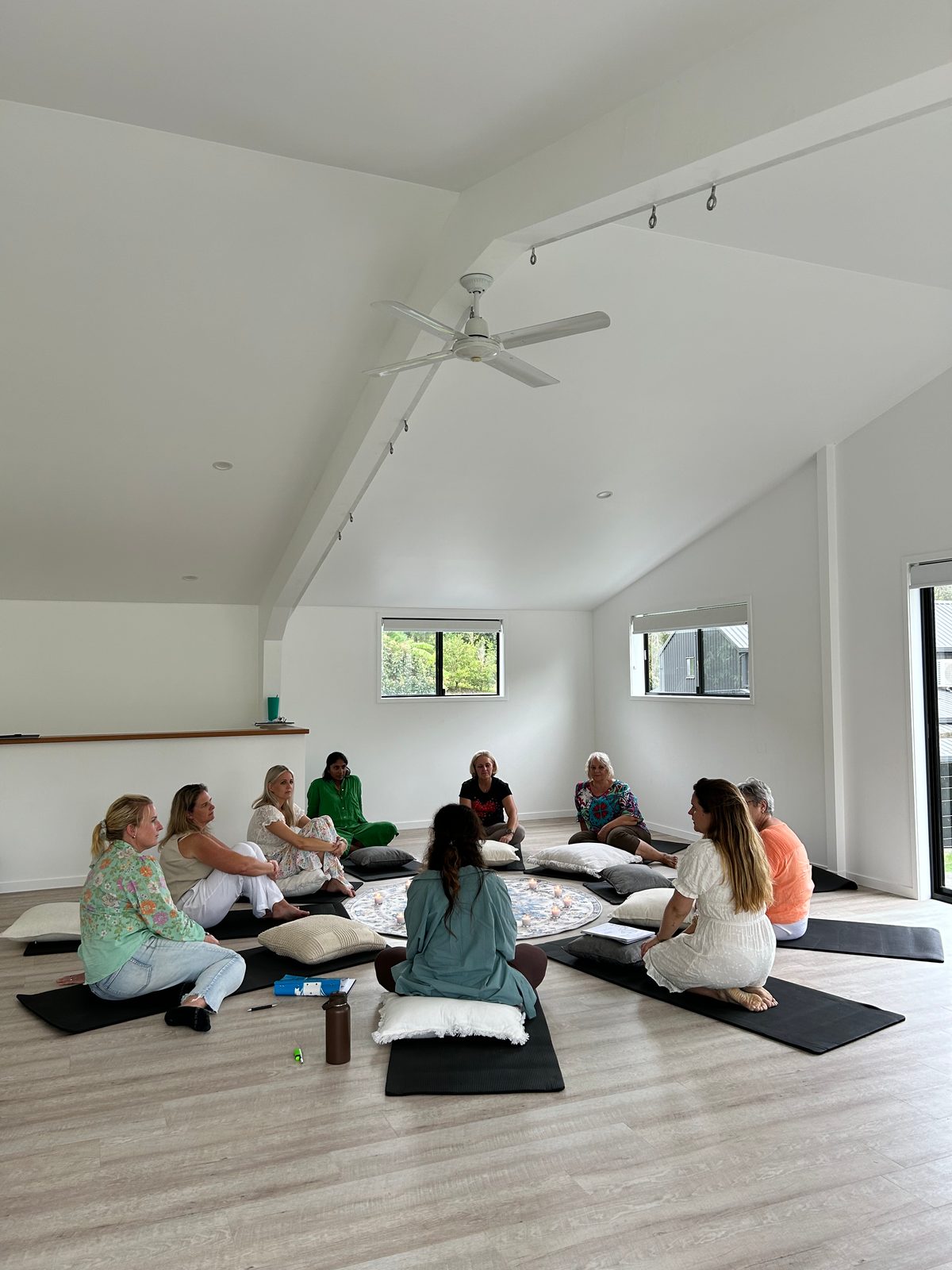 Entrepreneurs gathered in a supportive circle
