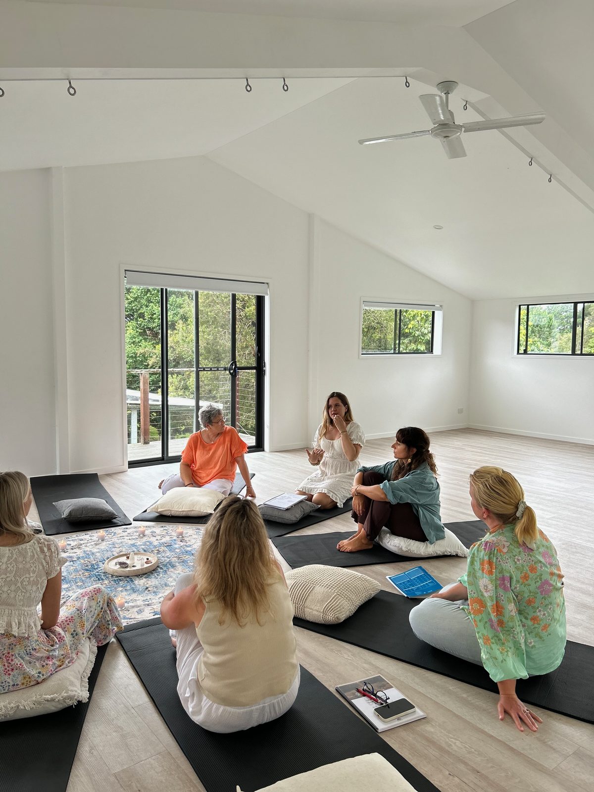 Entrepreneurs sharing in a supportive circle